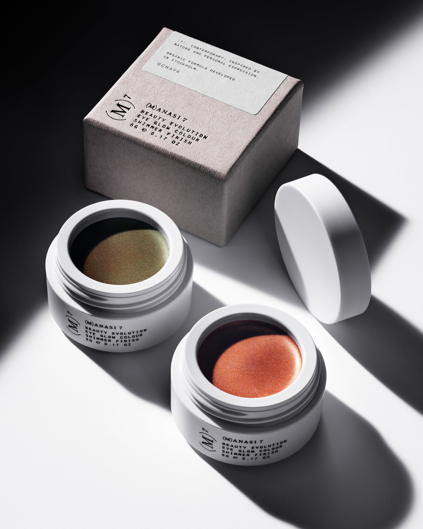 The Manasi 7 All over Colour in the sades Chaminade and Ochaya in front of their packaging