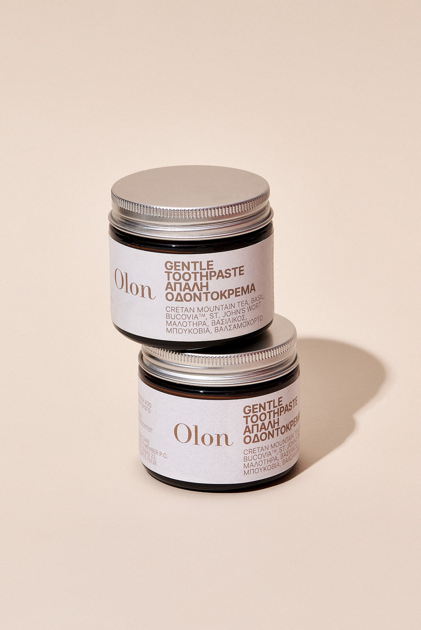 Two jars of Gentle Toothpaste by OLON