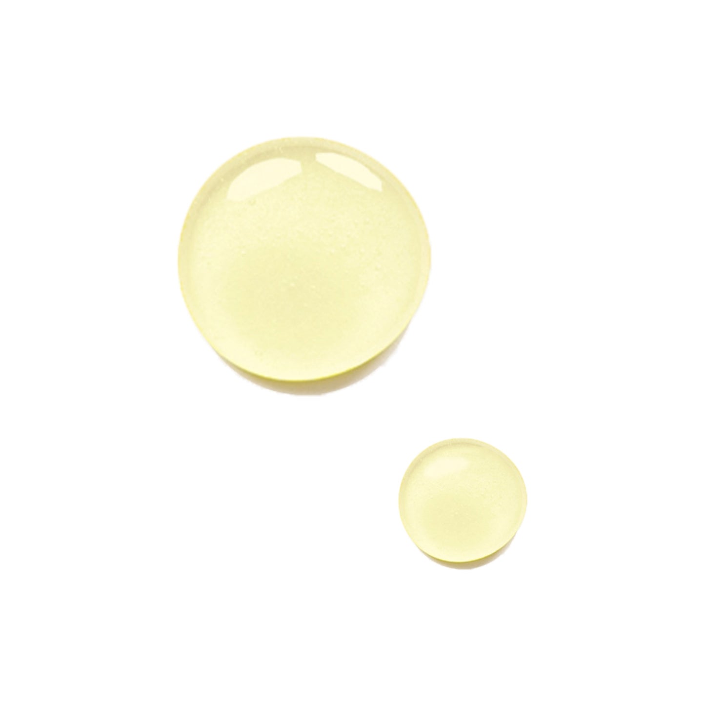 Close up of two drops of the Odacite Ap + P Soothing serum concentrate on a white background
