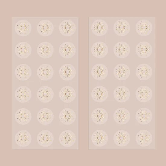 Two sheets of the Barriere vitamin D3 patch packaging with sun symbol design 