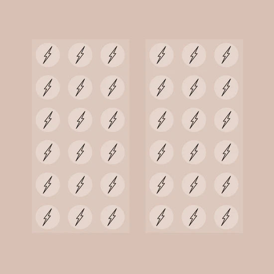 2 sheets of the Barriere Energy Boost vitamin B12 patch with the black bolt symbol