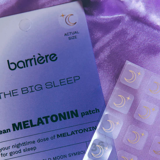 Barriere Melatonin patches with packaging on a purple fabric background