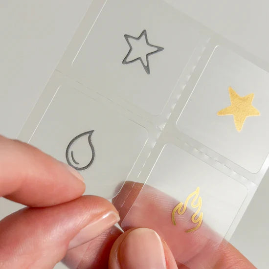 Close-up of the Barriere Youth Repair clean NAD+ patch with metallic elements symbols