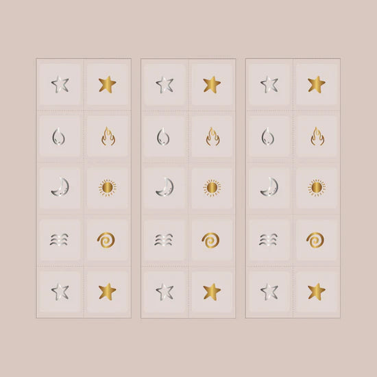 Two sheets of the Barriere Youth Repair clean NAD+ patch with gold and silver metallic elements symbols