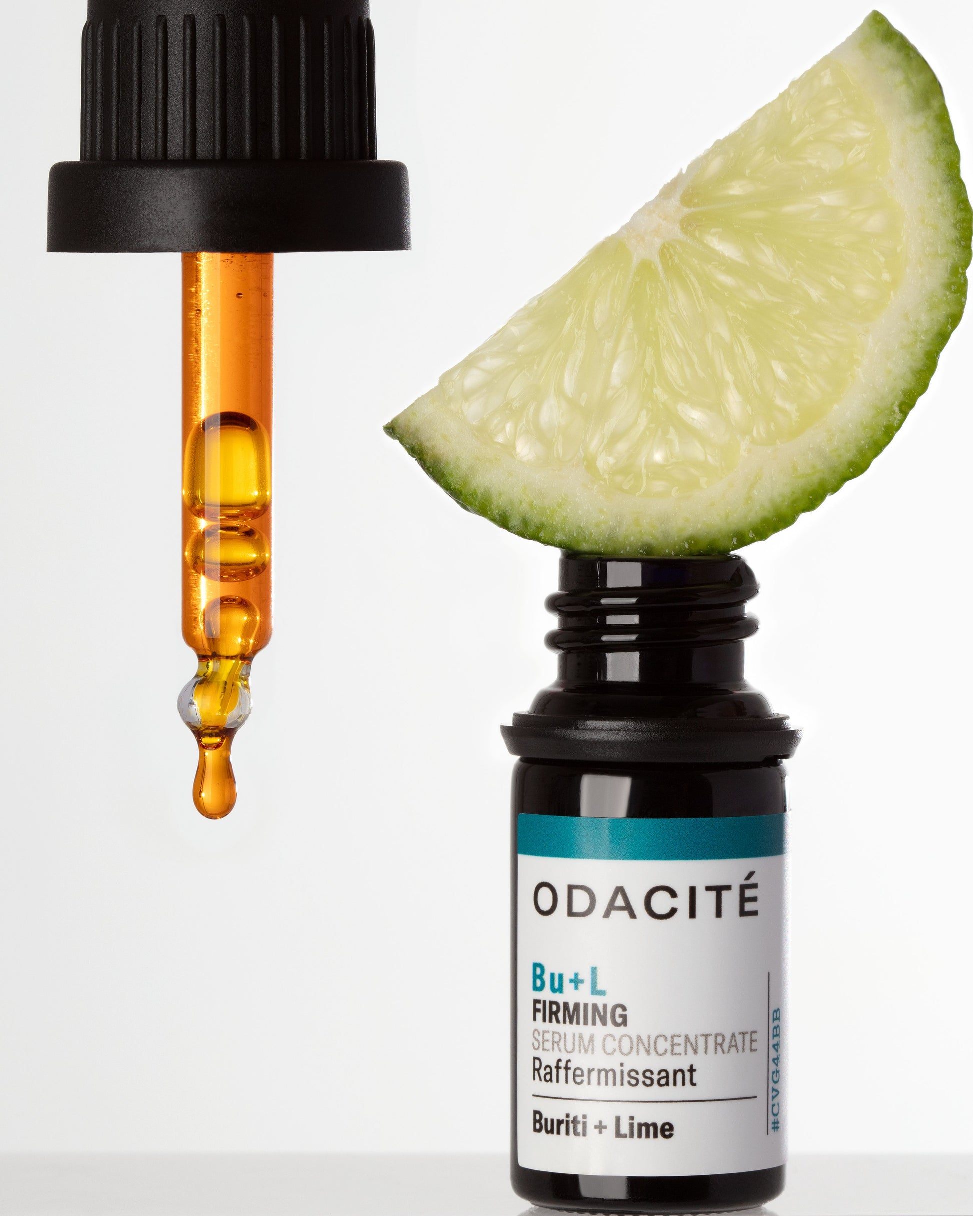ODACITé skincare Bu + L Firming serum bottle with a dropper and lime wedge on a white background
