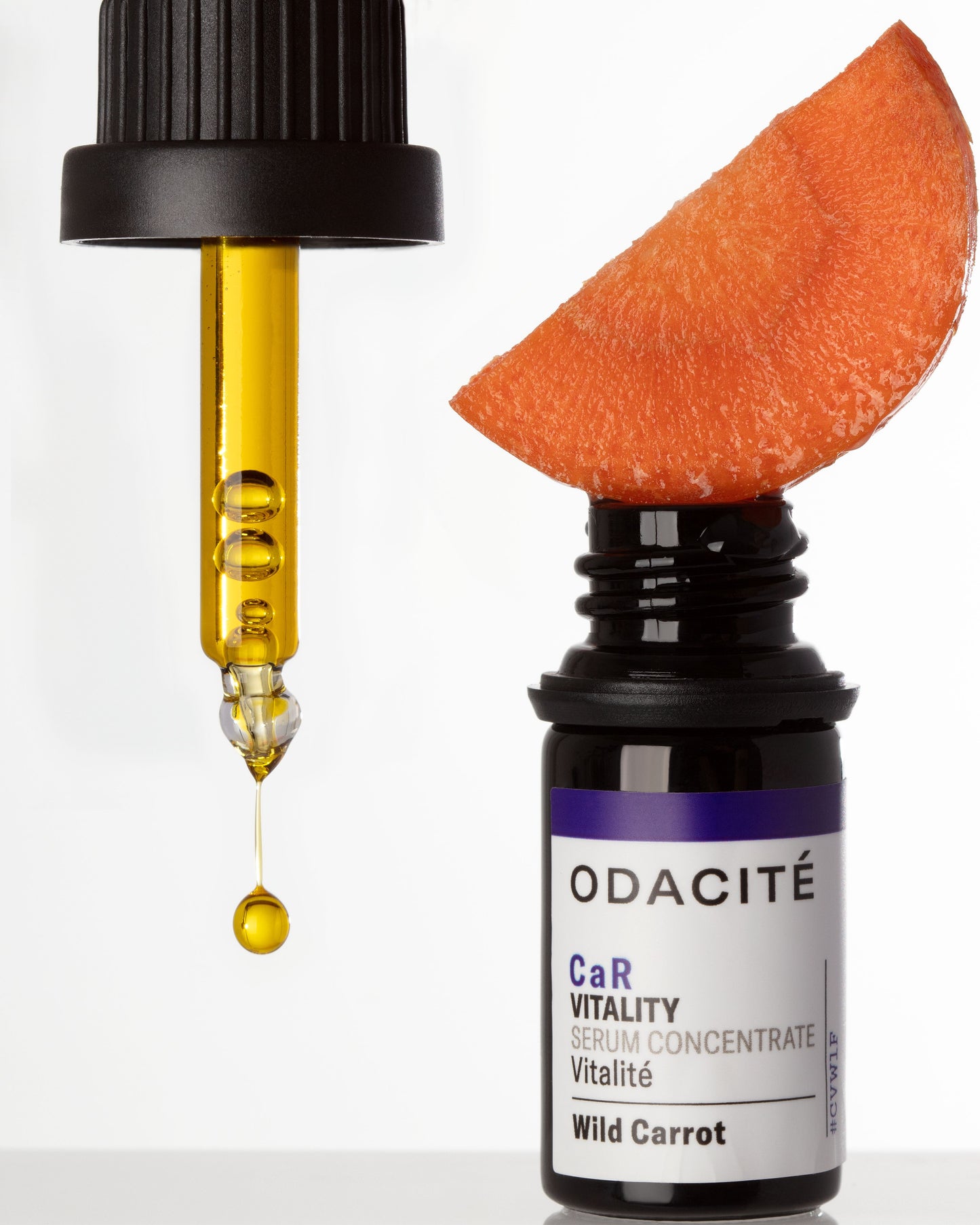 ODACITé CaR Vitality serum concentrate with a dropper and carrot slice on a white background