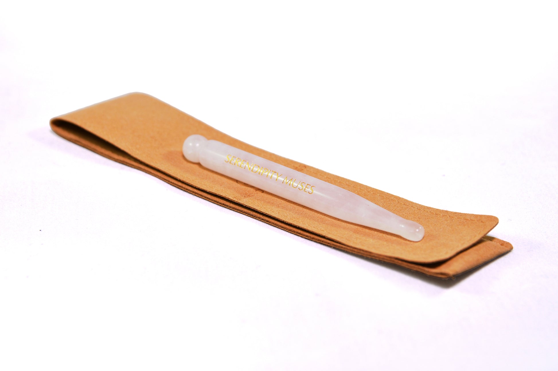     Dual-ended rose quartz facial tool with pouch
