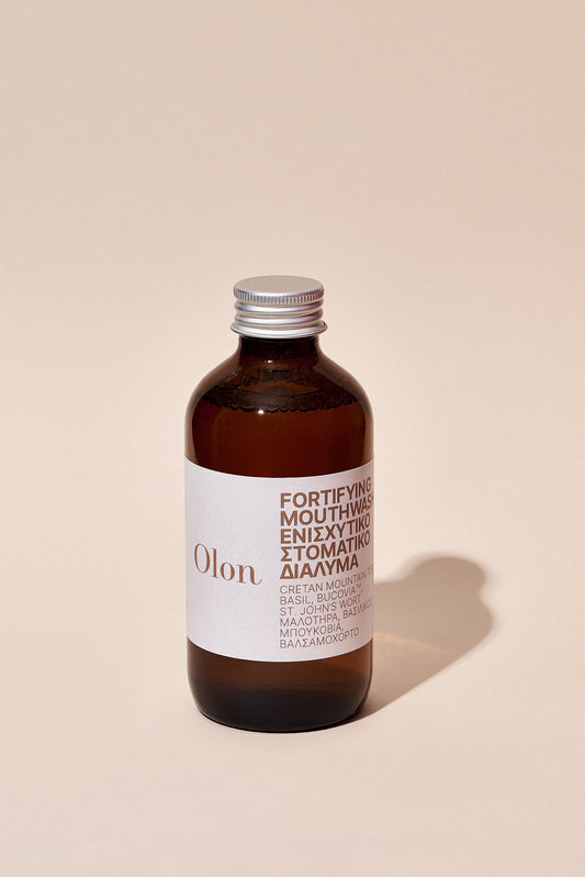 A bottle of the Fortifying Mouthwash by Olon