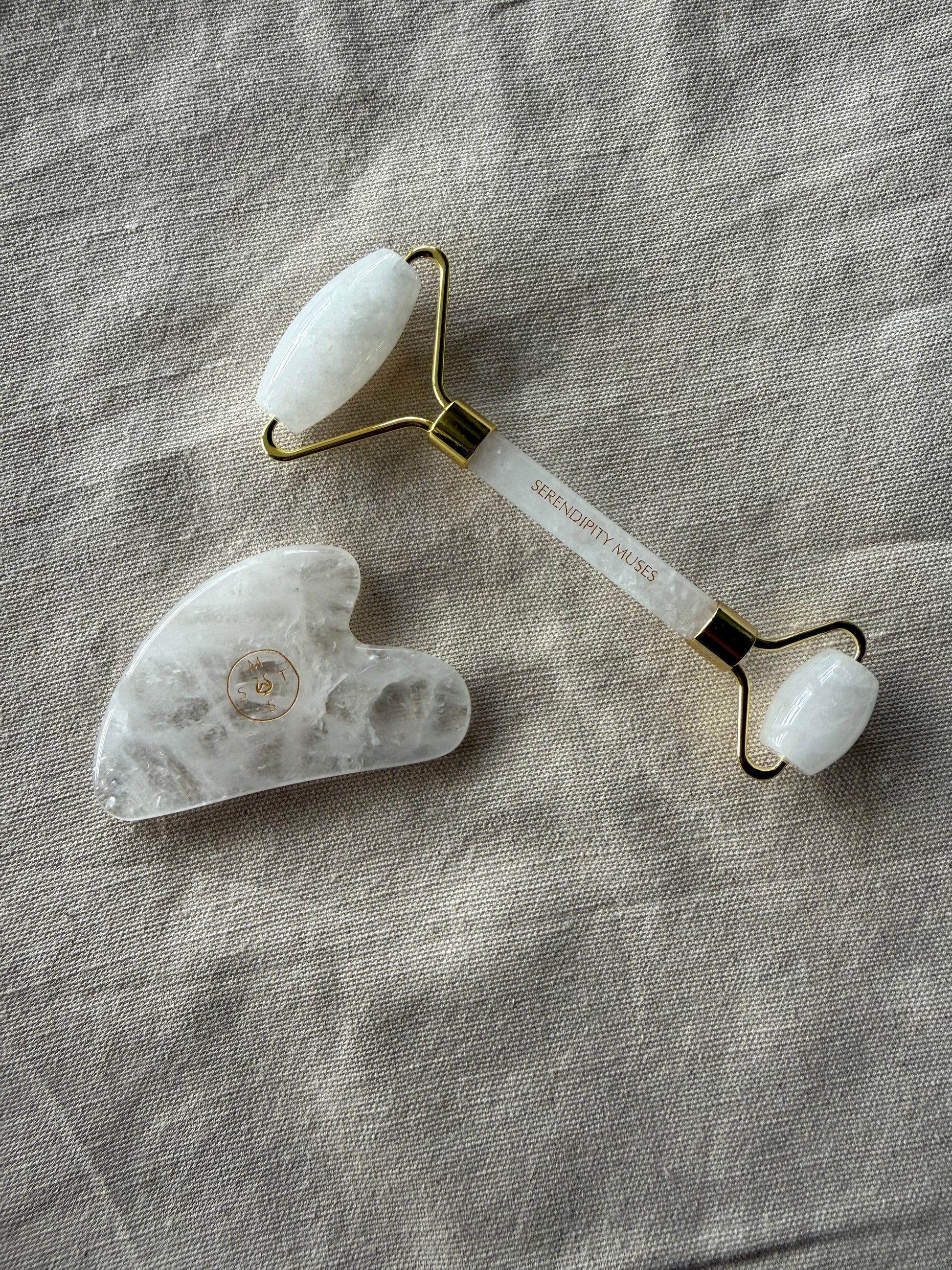     Premium clear quartz beauty tools designed for facial massage, depuffing, and glow