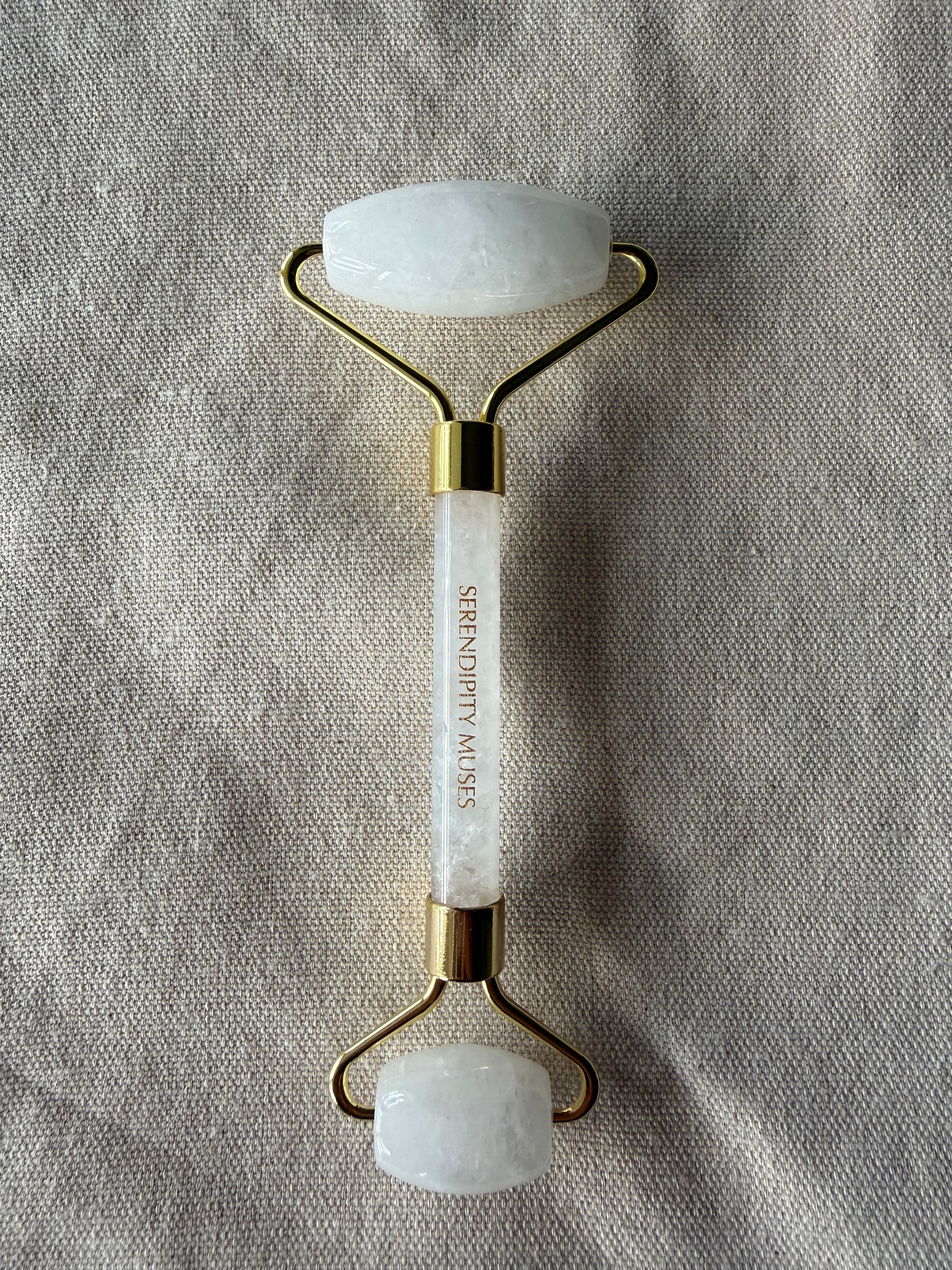     Luxury clear quartz skincare tools for facial massage and product application roller