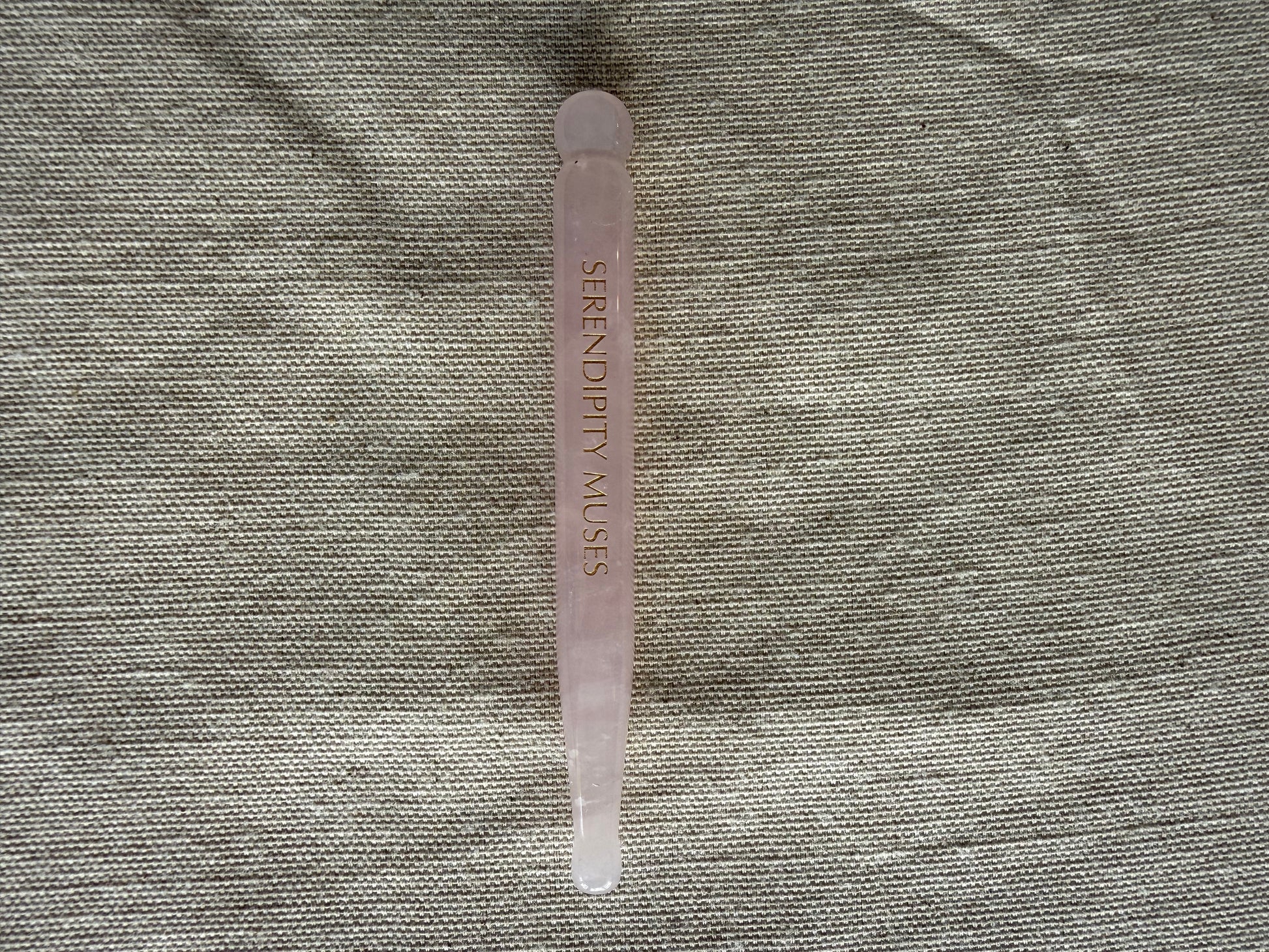     Traditional inspired rose quartz acupressure tool for facial vitality and glow
