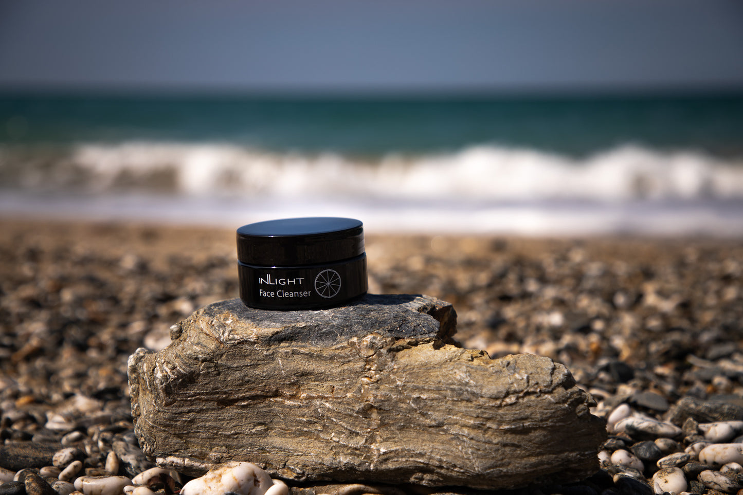  a jar of Inlight Face Cleanser