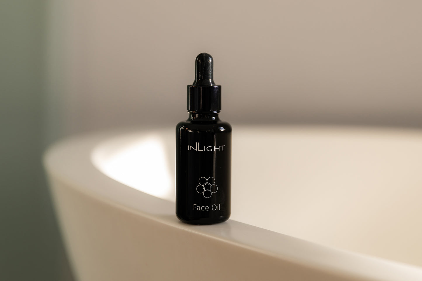 the Inlight Face Oil bottle 