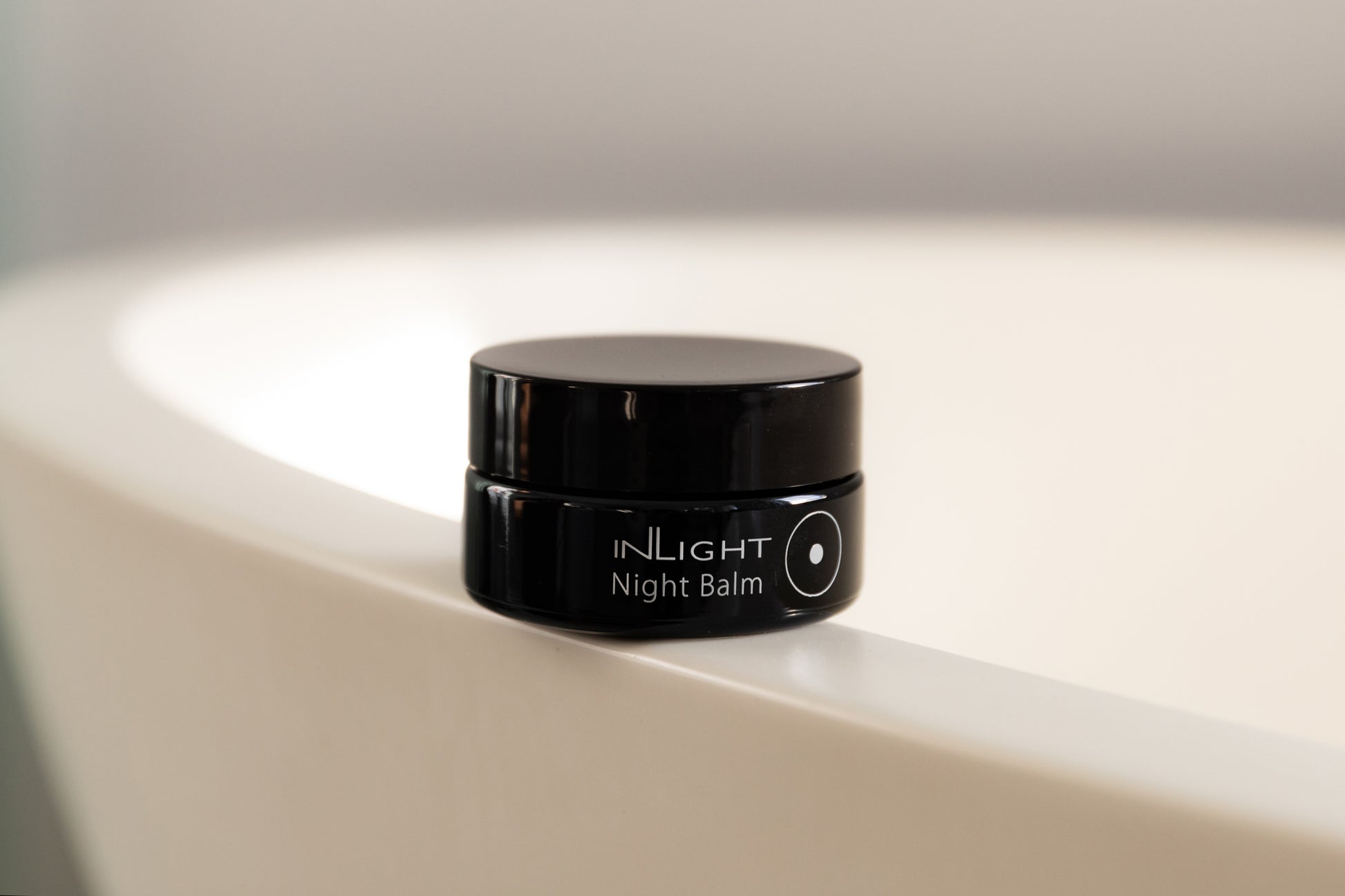 A jar of the inLight Night Balm 
