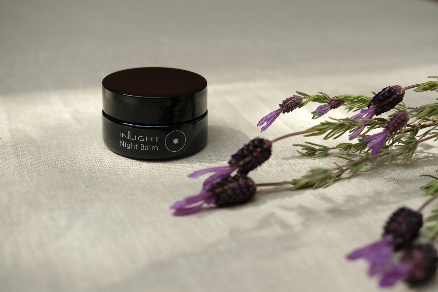 A jar of the inLight Night Balm 