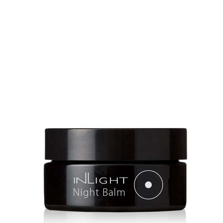 Black jar of inLight Night Balm on a white background