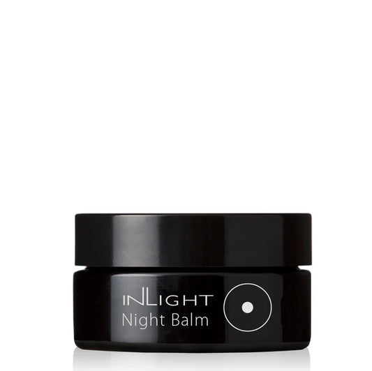 Black jar of inLight Night Balm on a white background