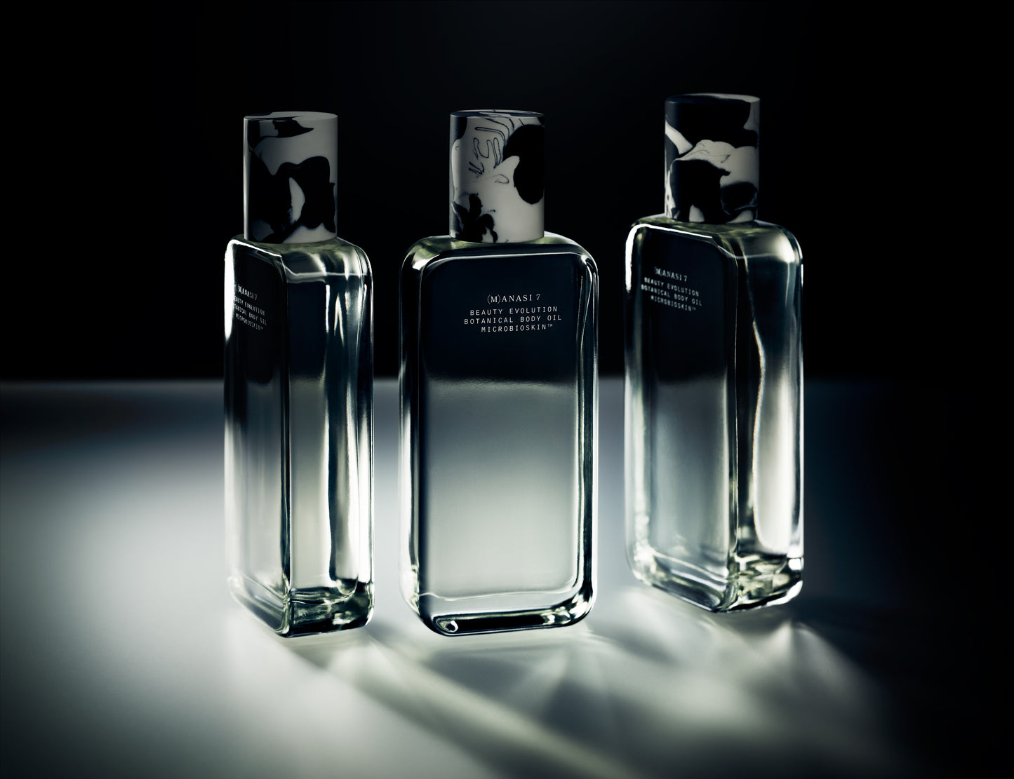 3 Glass bottles of the Manasi 7 Botanical Body Oil 