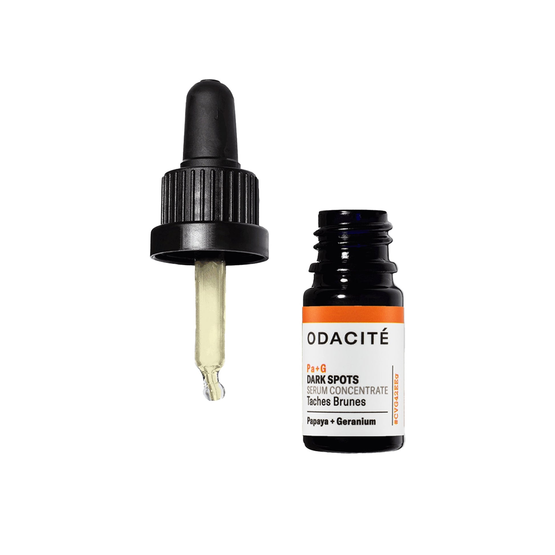 Odacite dark spots serum concentrate with dropper on a white background
