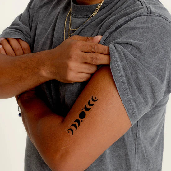 Person wearing the barriere Brains & Beauty Patch with designs