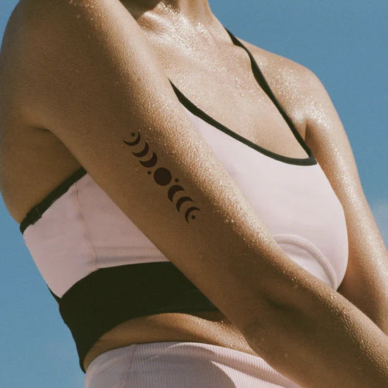 Person wearing the barriere Brains & Beauty Patch with designs