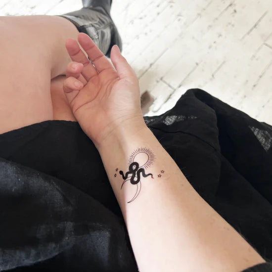 Person wearing the barriere Brains & Beauty Patch with designs