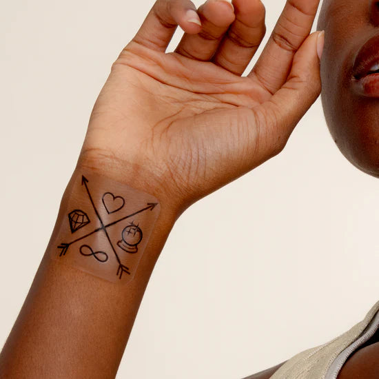 Person wearing the barriere Brains & Beauty Patch with designs