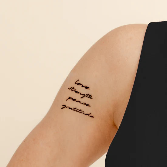 Person wearing the barriere Brains & Beauty Patch with designs