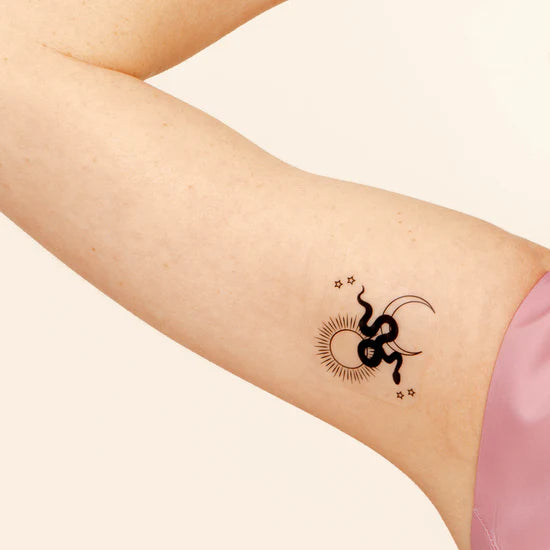 Person wearing the barriere Brains & Beauty Patch with designs