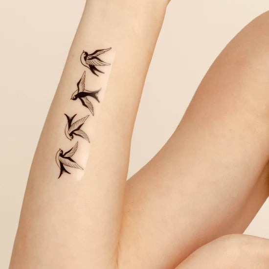 Person wearing the barriere Brains & Beauty Patch with designs