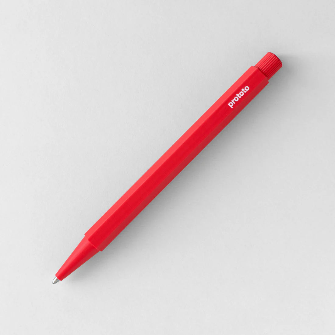 Red pen with 'prototo' branding on a light gray background