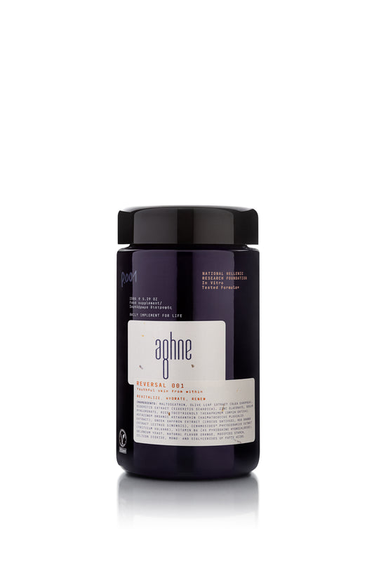 Black container of reversal 001 by agnhne with a white label featuring the brand 'aghne' on a white background