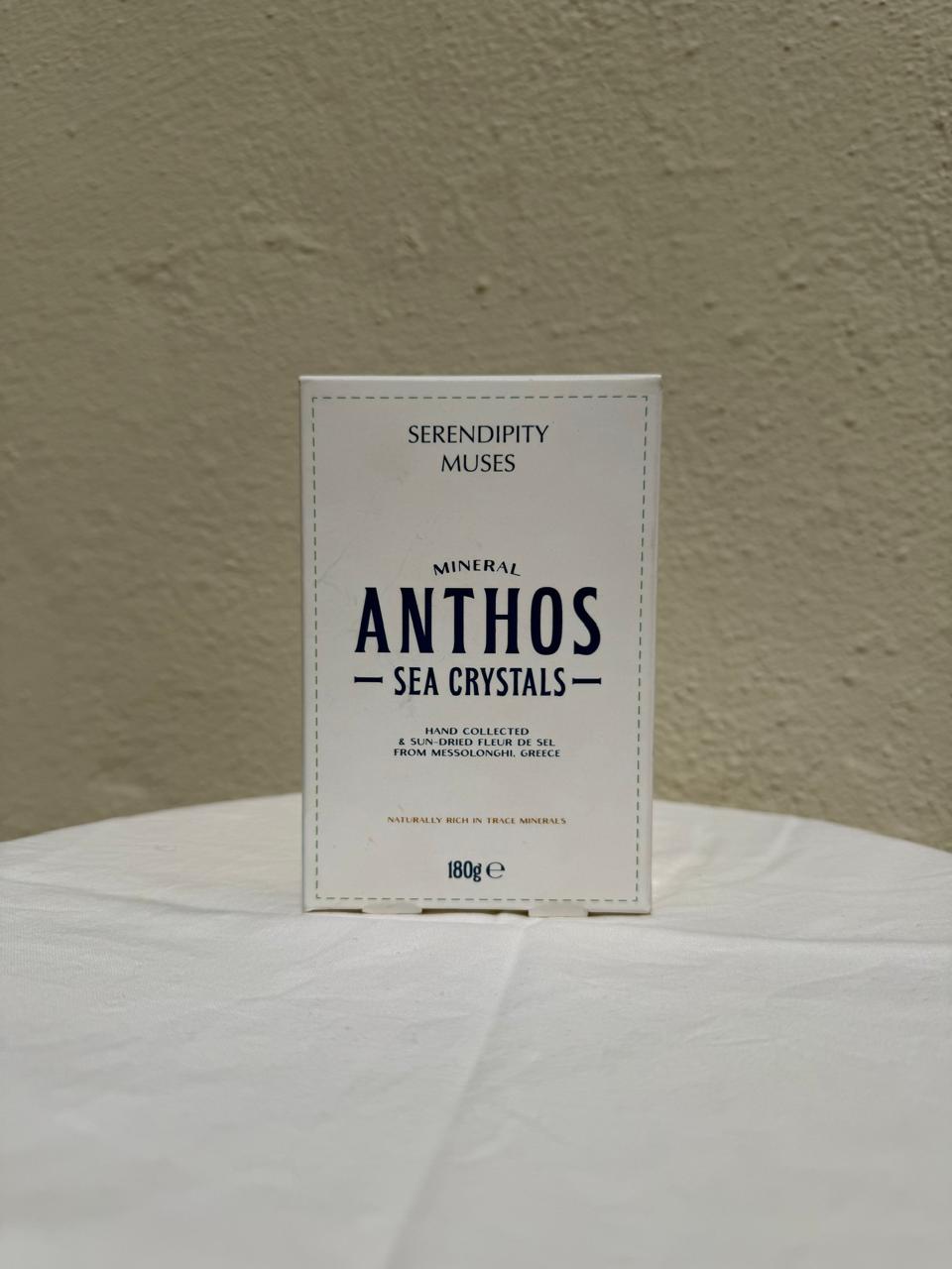 Box of Serendipity Muses Anthos Sea Crystals on a white surface with a beige background