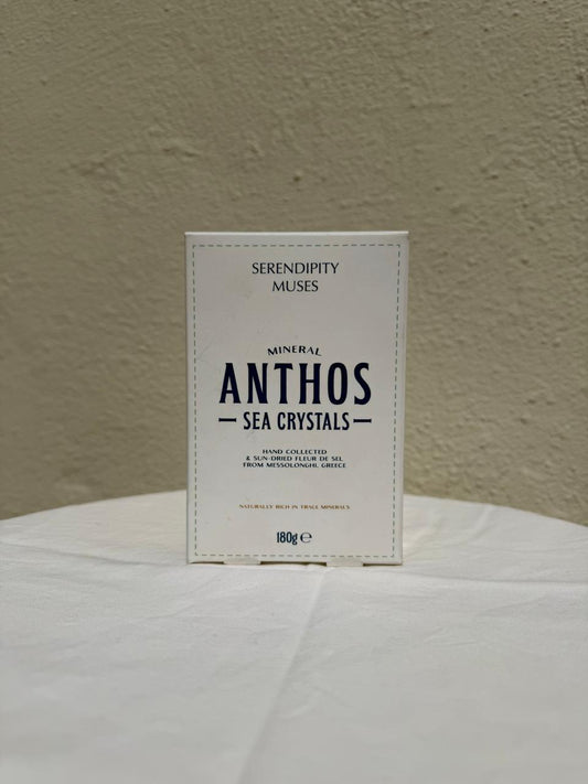 Box of Serendipity Muses Anthos Sea Crystals on a white surface with a beige background