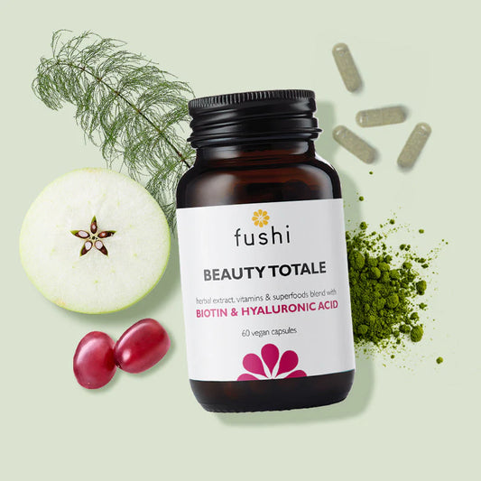 Fushi Beauty Totale supplement bottle with capsules for natural beauty, radiance, healthy skin and nails. 