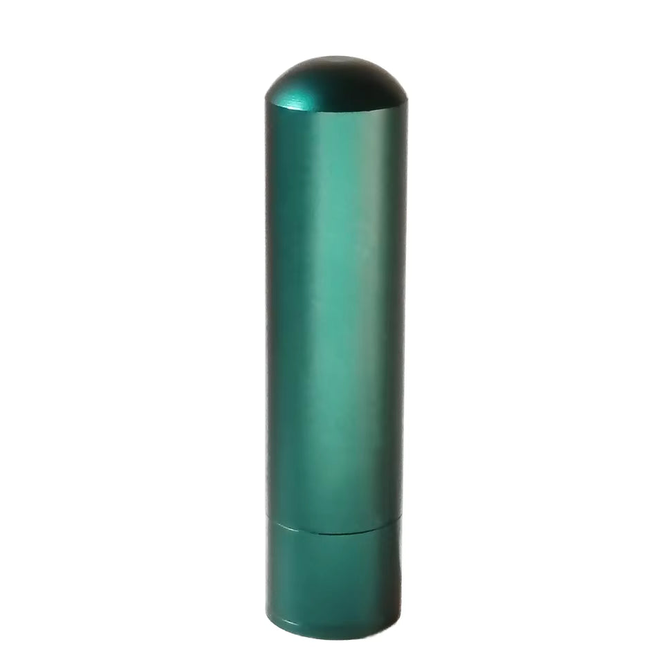 Green cylindrical nasal inhaler on a white background