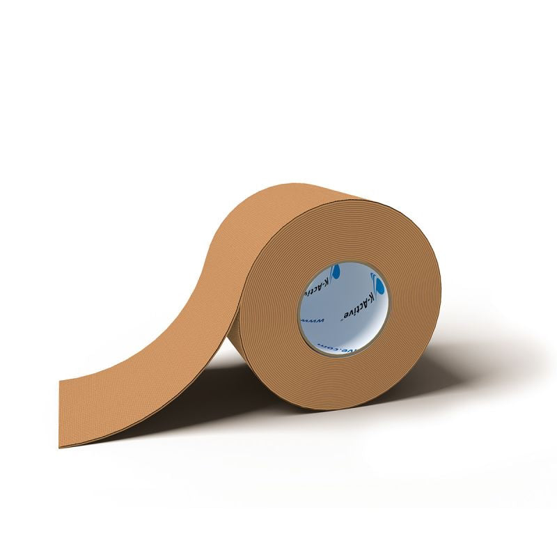 Beige kinesiology tape roll on a white background