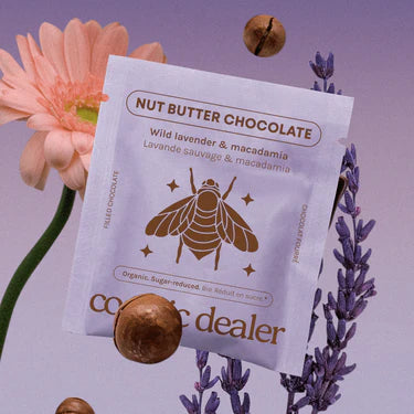Nut butter chocolate package  Wild Lavender & Macadamia with flowers and nuts on a purple background