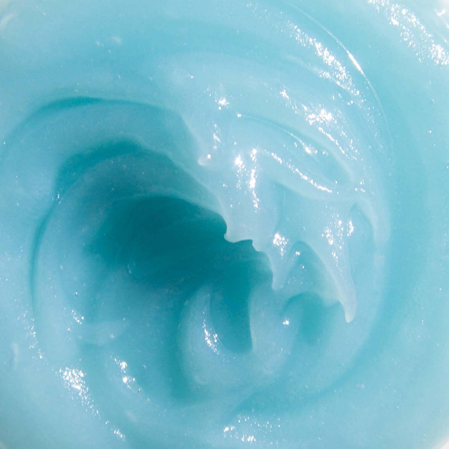 Close-up of le Blue Balm by Odacite with a central depression.
