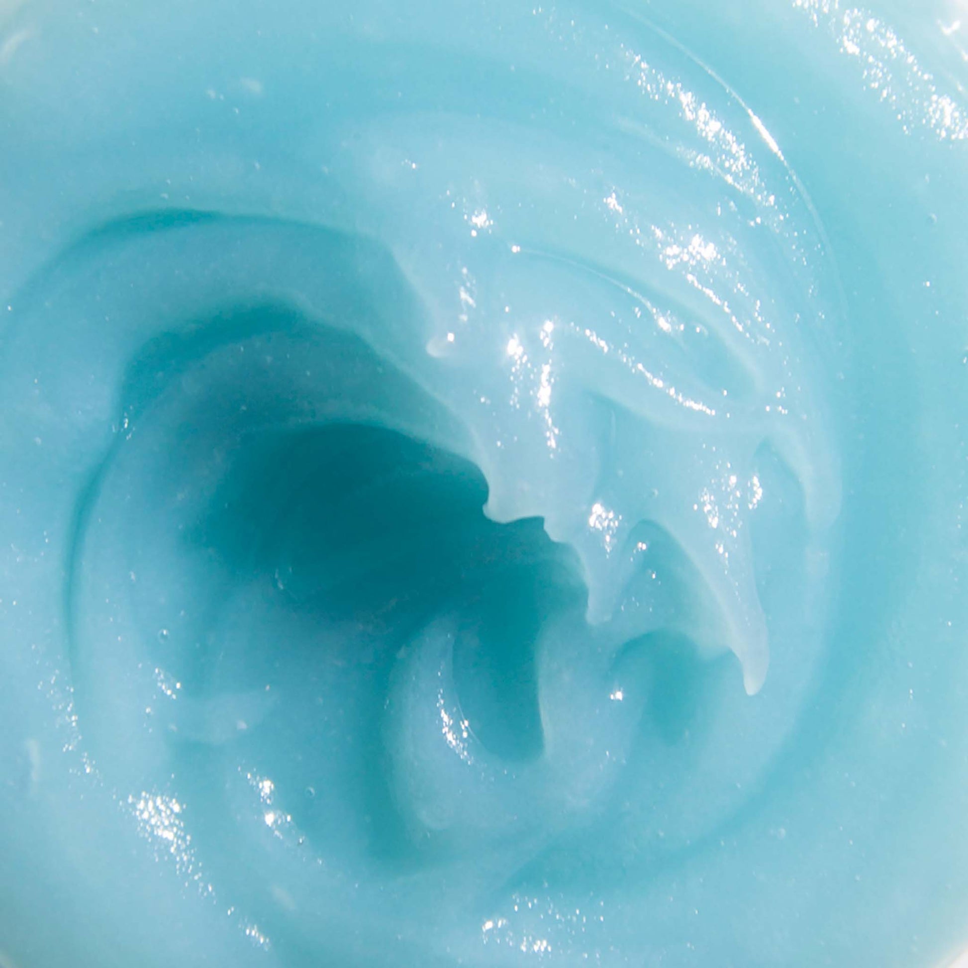 Close-up of le Blue Balm by Odacite with a central depression.