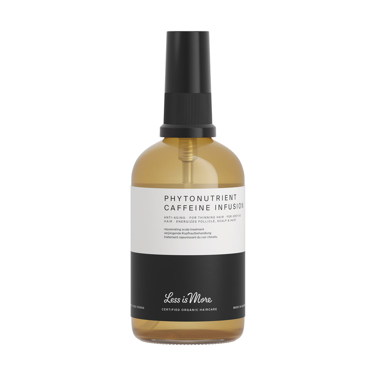 Less is More Phytonutrient Caffeine Infusion 100ml in an amber glass spray bottle with black cap – organic botanical leave-in scalp treatment with caffeine for thinning and greying hair.