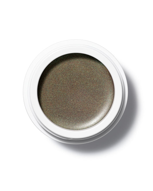 The Manasi 7 Eye Glow Colour in the shade Ochaya in a small round container on a white background