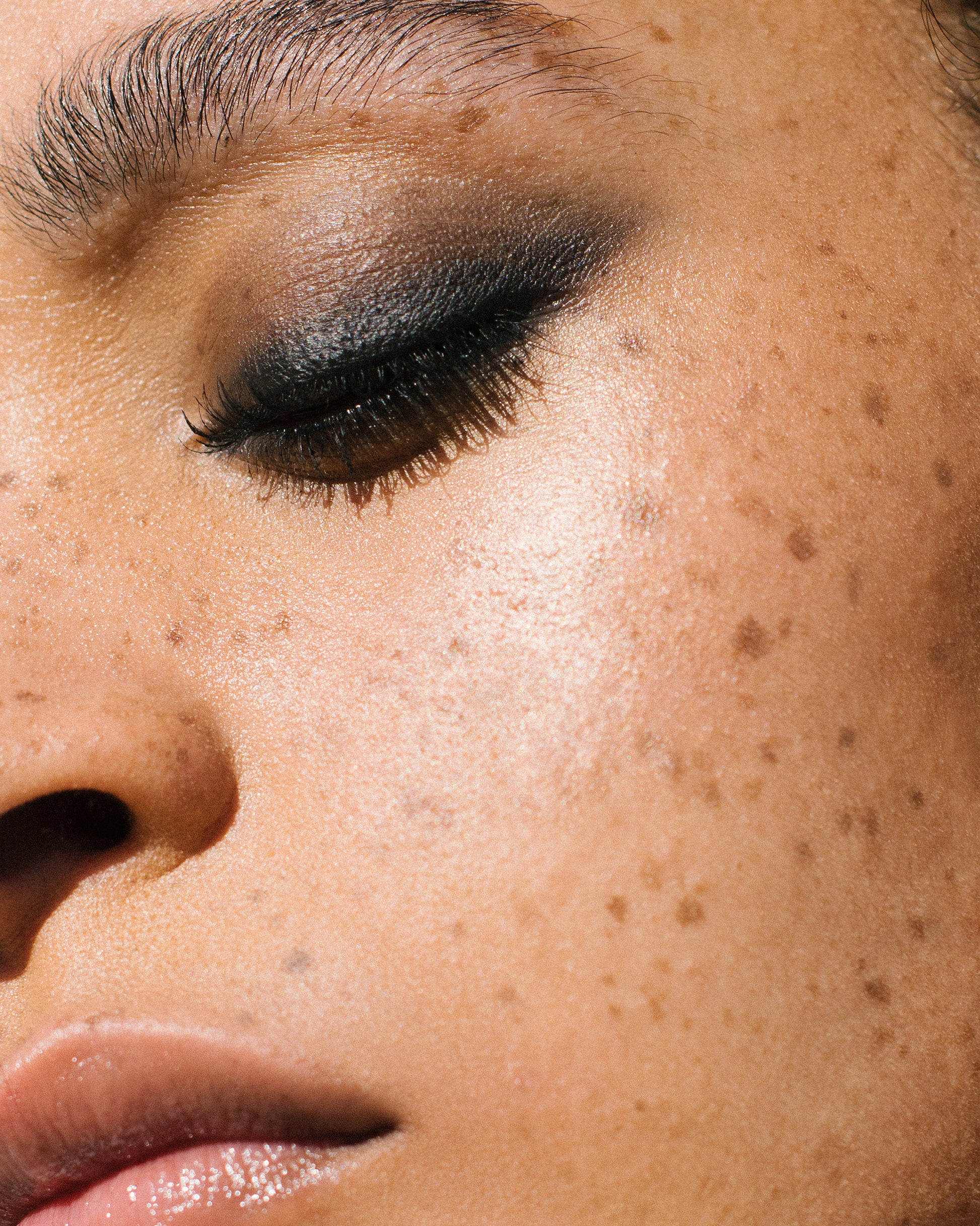 Close-up of a person's eye with dark eyeliner and the Manasi 7 precision mascara