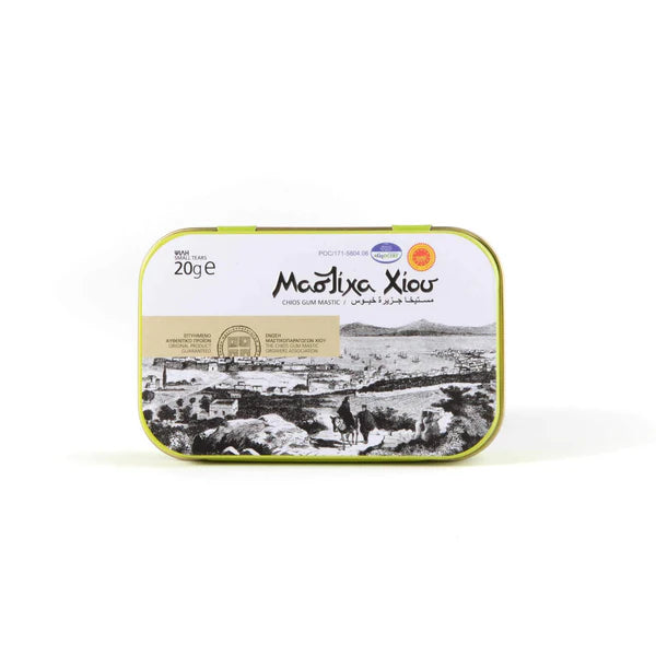 Tin packaging of Chios Gum Mastic with a scenic illustration on a white background