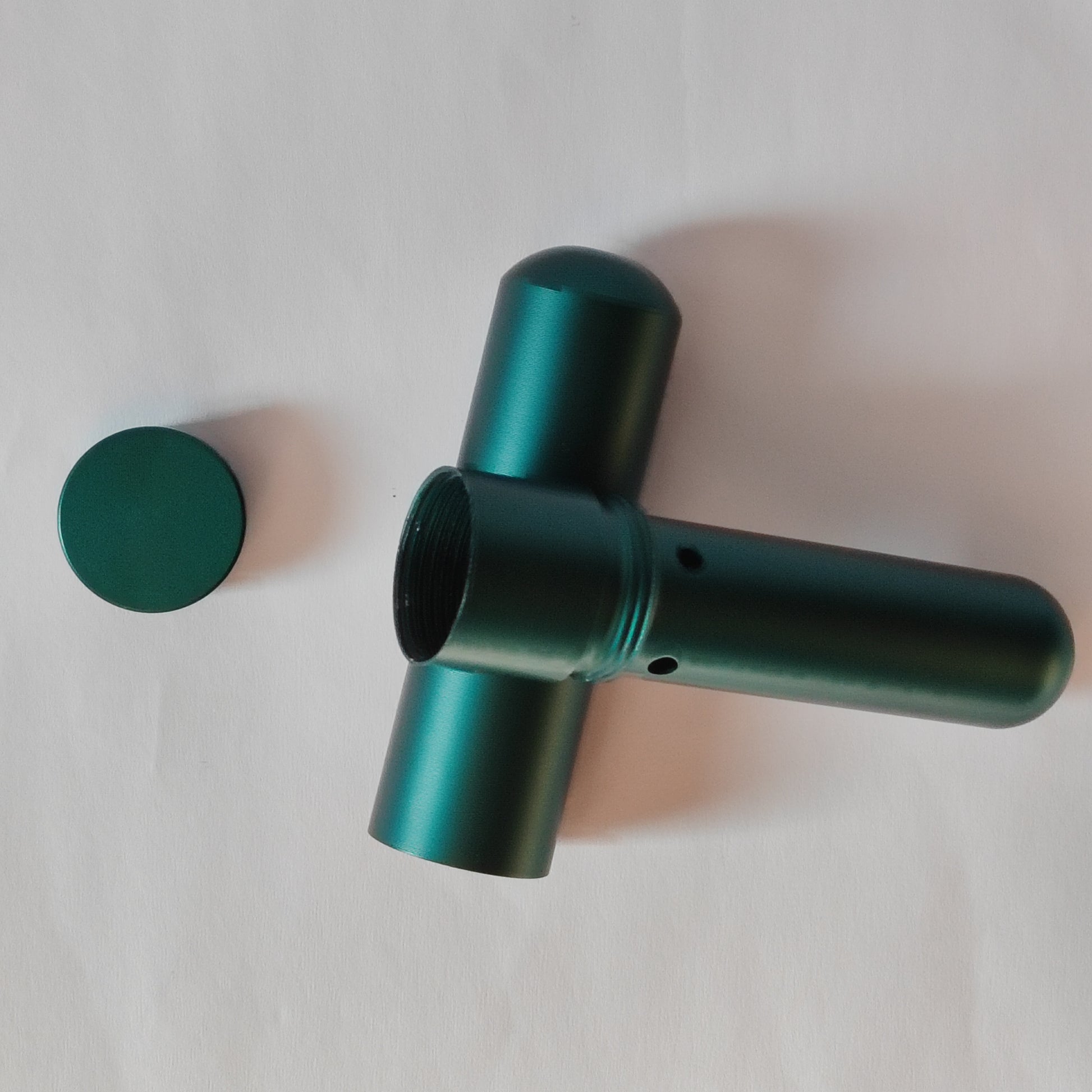 Green nasal inhaler on a white background
