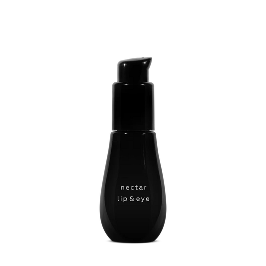 Black bottle labeled 'nectar lip & eye' by ayuna on a white background