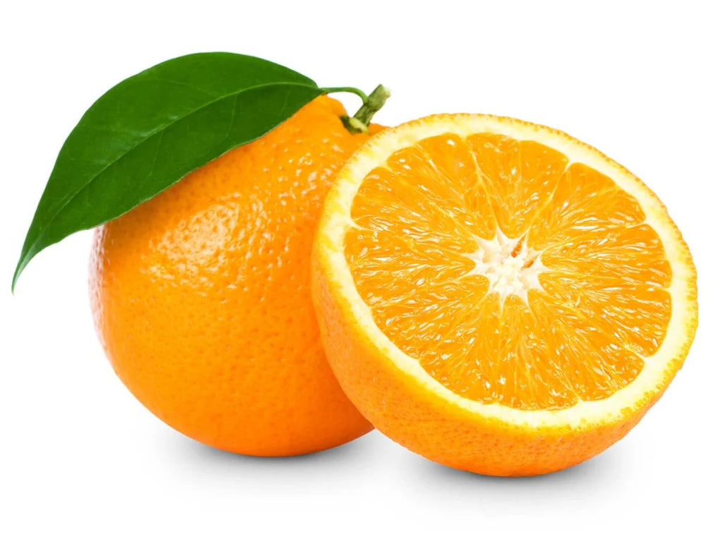 Whole and sliced orange with a green leaf on a white background