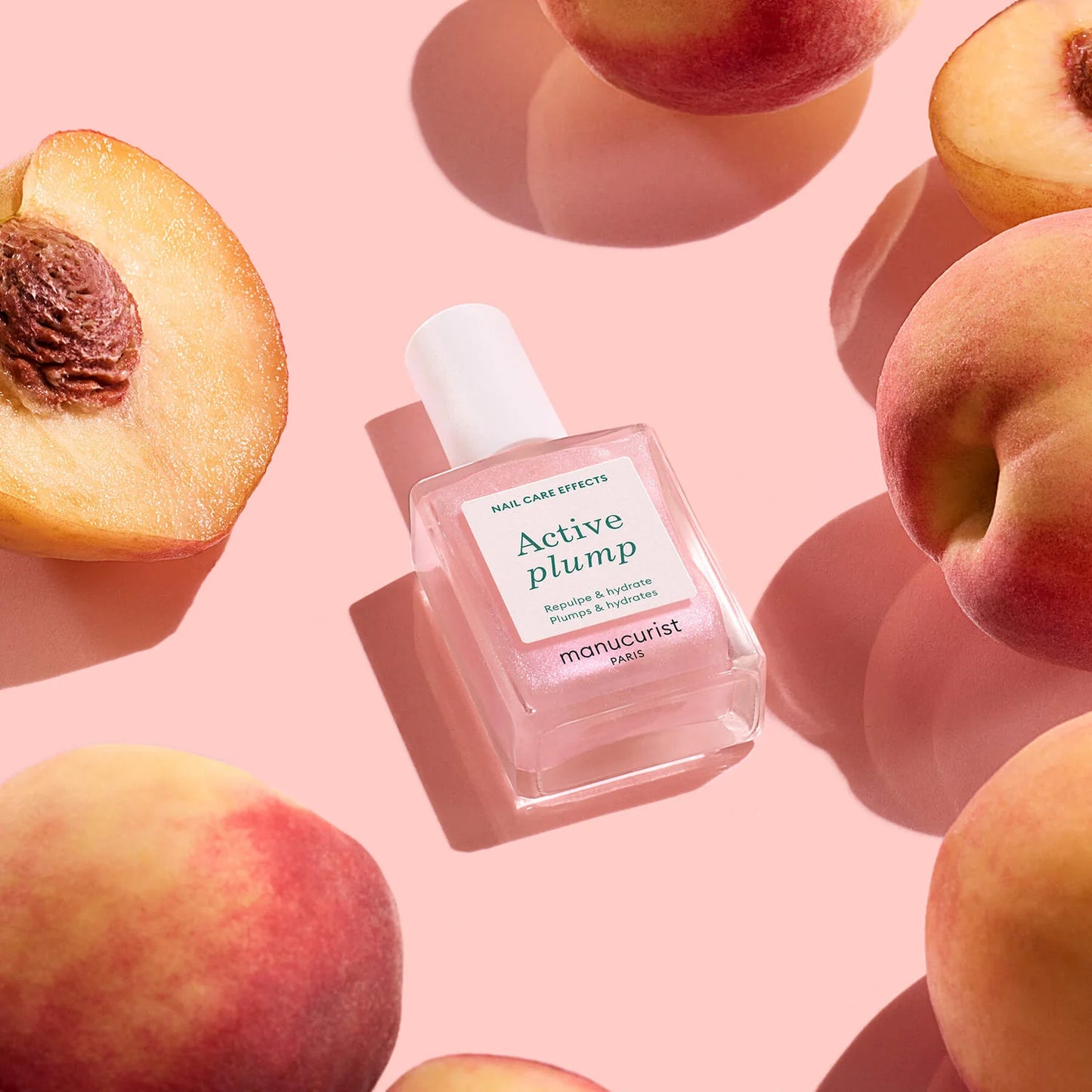 Manucurist Active Plump – collagen-infused nail care polish with peach extract and AHA for hydrated, glossy nails.