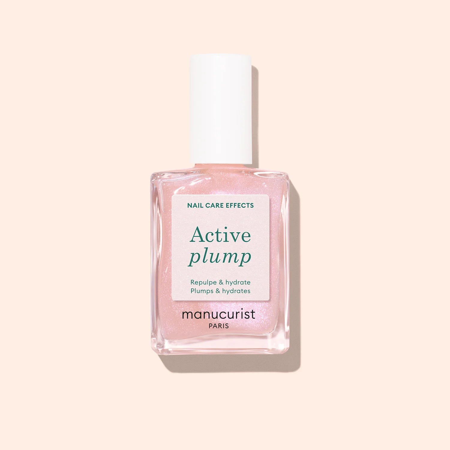 Manucurist Active Plump – collagen-infused nail care polish with peach extract and AHA for hydrated, glossy nails.