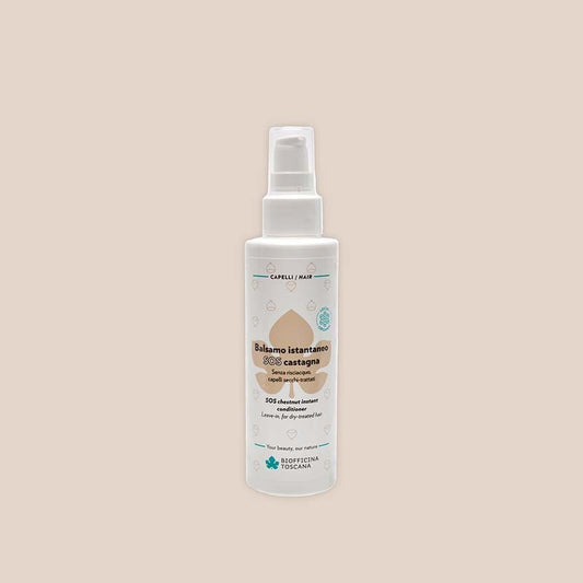 White spray bottle of the Biofficina Toscana SOS chestnut instant conditioner
with a label on a beige background